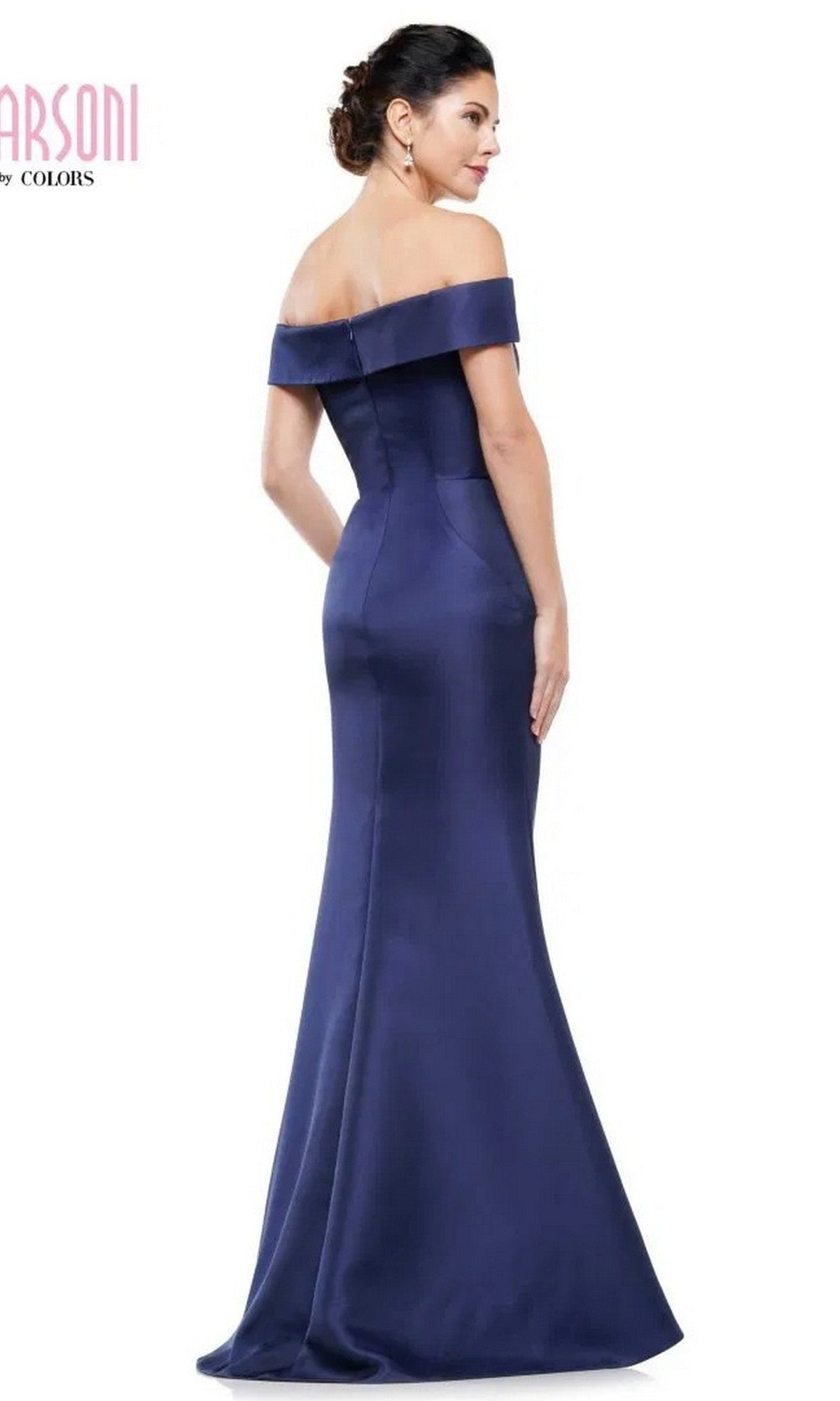 A woman stands with her back to the camera in a floor-length, fitted, off-the-shoulder navy blue Marsoni MV1153 long formal dress against a plain white background.